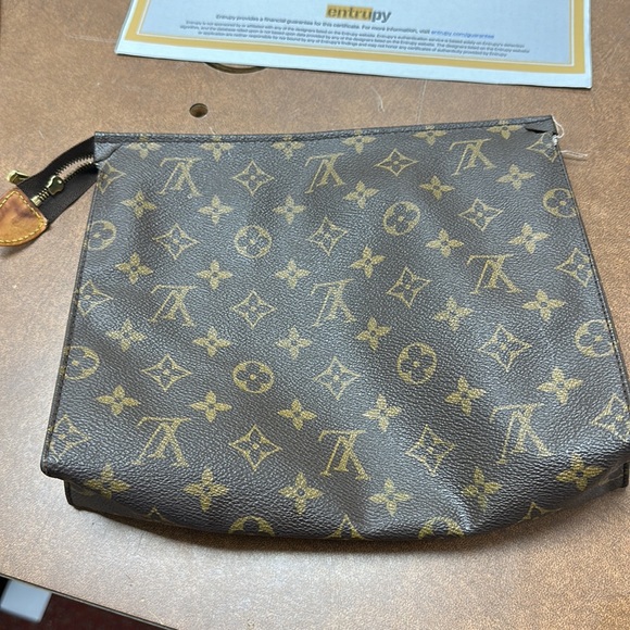 Louis Vuitton, monogram canvas used cosmetic Poche Toilette NM - Picture 7 of 8